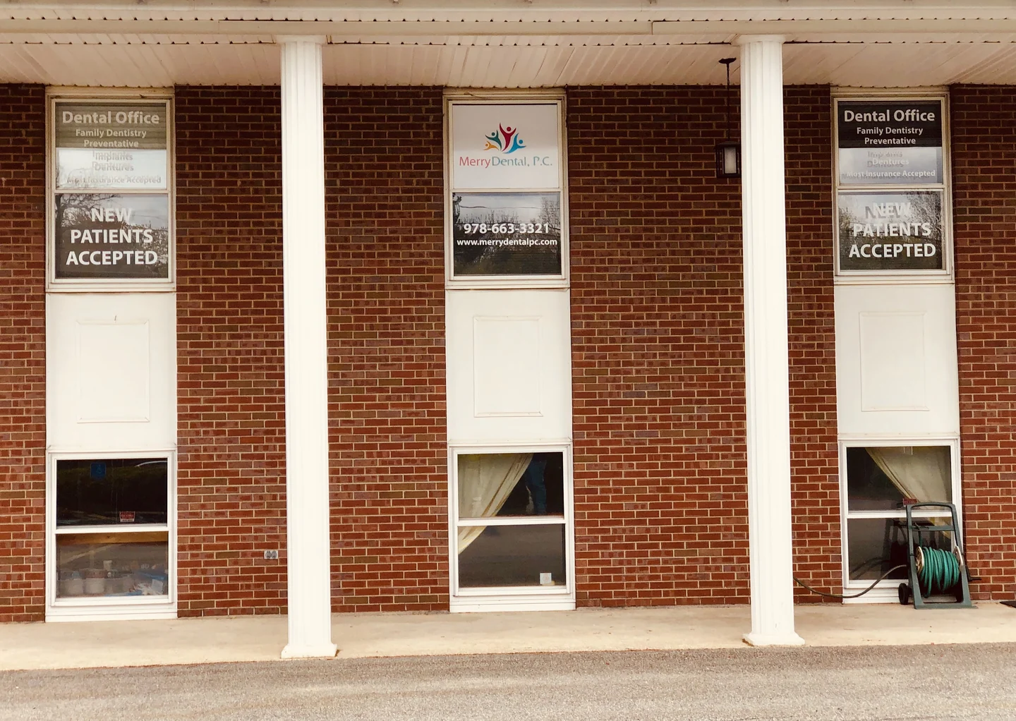 The Merry Dental office on Boston Road, with New Patients Accepted in the window